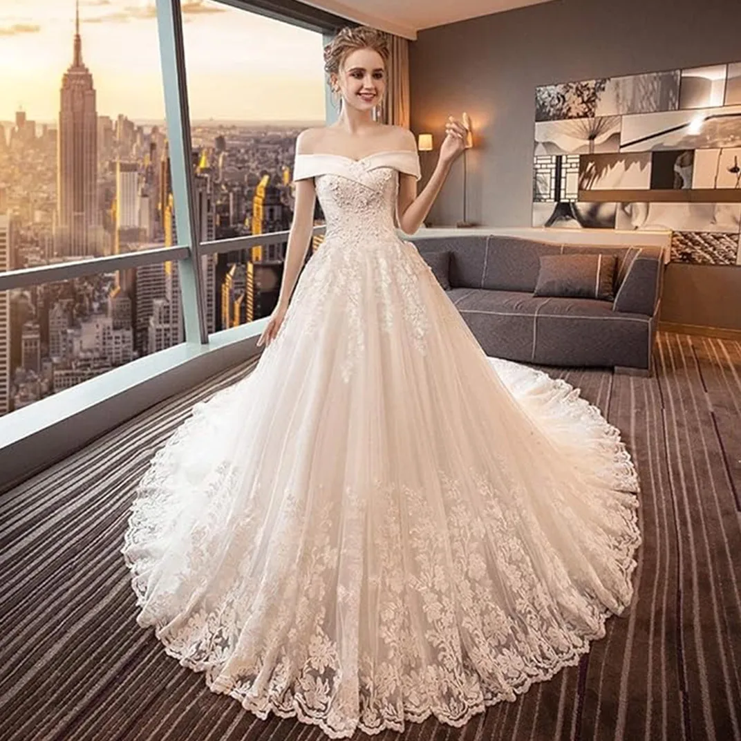 

LAYOUT NICEB Long Sleeves Wedding Dresses Luxury Ball Gowns Robe De Mariee Appliques Beading Bride Illusion Vestidos Novia