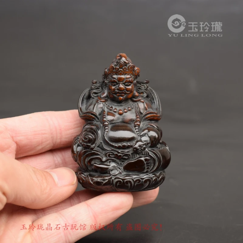 

Yak horn fine carving yellow God of wealth Buddha small ornaments to do old horn carving Tantric Buddha idol text play