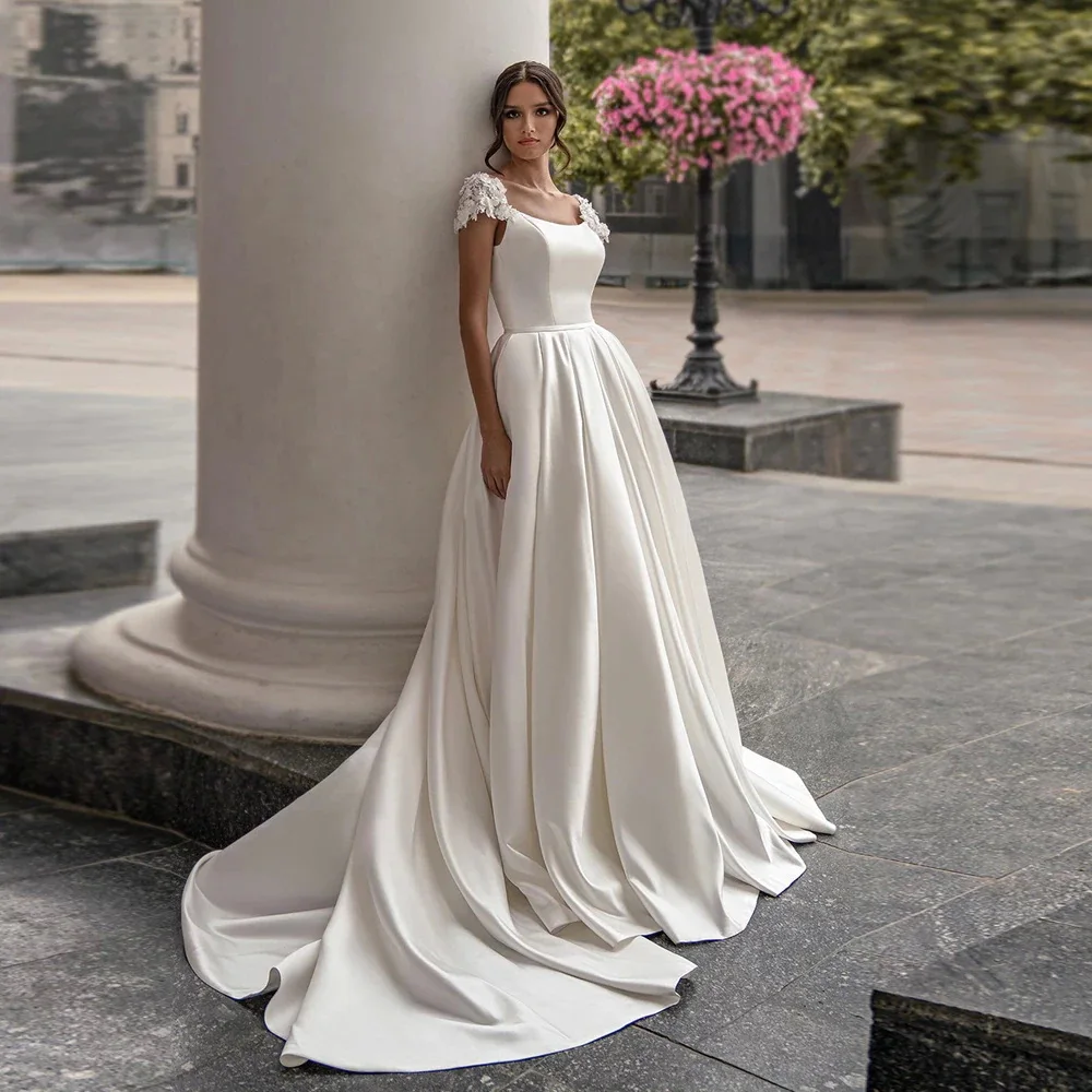 

Best Ball Gown Wedding Dress Robe de Mariage Cap Sleeves with Appliques Details Princess Satin Bridal Gowns Plus Size