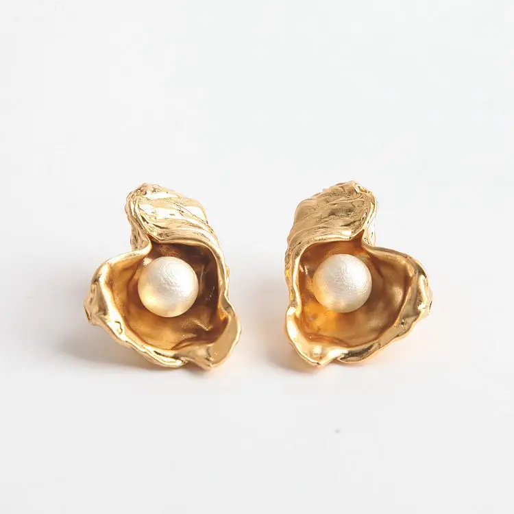 

Vintage gold and metallic ruffles with cotton ball pearl ear clips