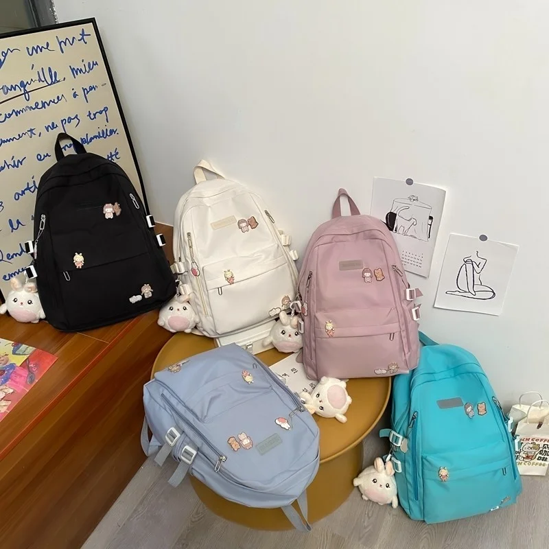 

Kawaii Pendant Women Backpack Cute Badge School Bag For Girls Large Capacity Waterproof Travel Backpack Nylon Bookbags 2022