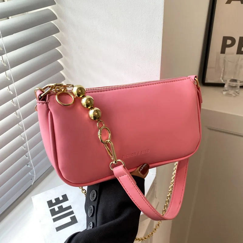 

Однотонные маленькие кожаные сумки через плечо для женщин, сумка на цепочке под подмышек 2022, популярные простые Роскошные брендовые сумки и...