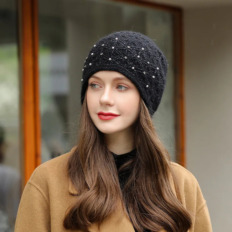 

The new fashion label knitted hat han edition in the fall and winter of female joker hat warm earmuffs baotou cap tide female