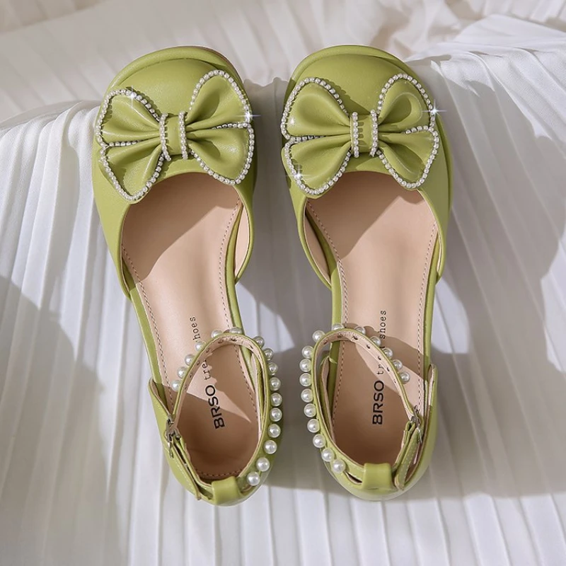 

New high heels in spring and summer women's thick heels student pearl Baotou sandals