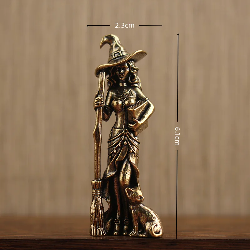 

Металлическая статуэтка ведьмы