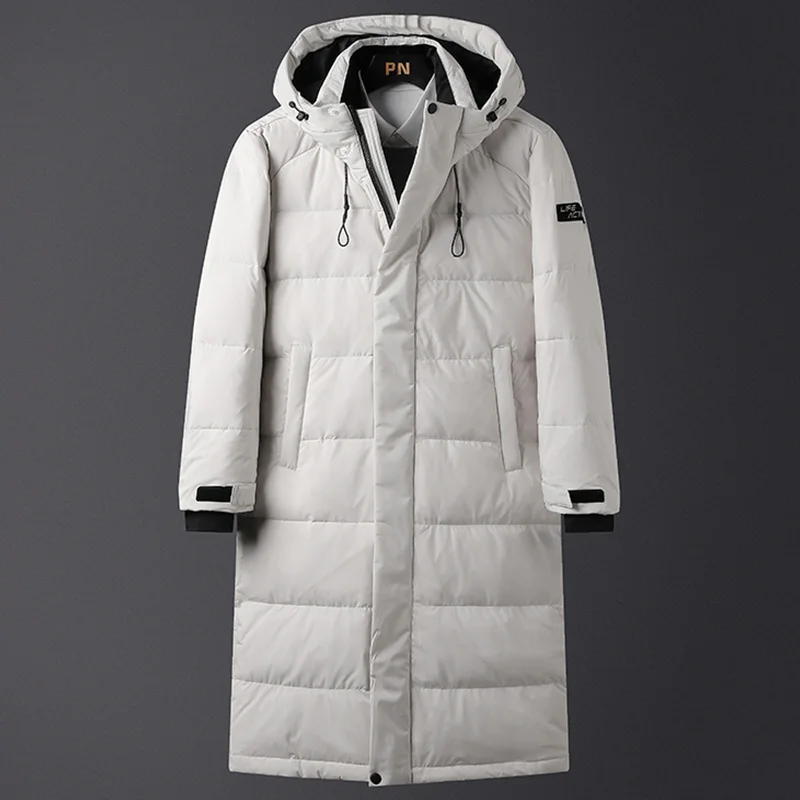 

Мужской зимний длинный пуховик, новинка 2023, модная Свободная куртка с капюшоном в Корейском стиле, ветрозащитная мягкая куртка, пуховик для мужчин