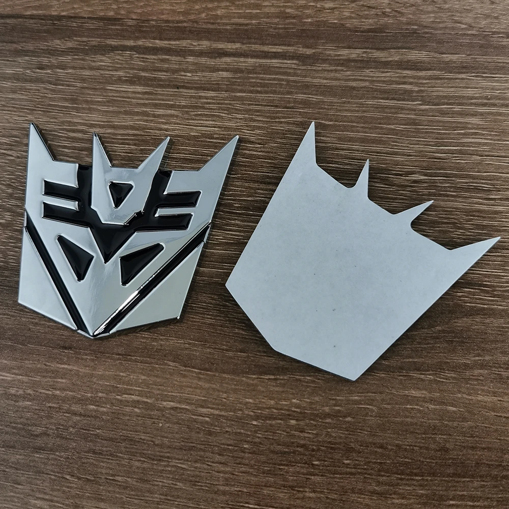 

3D значок автоботов, наклейки из алюминиевого сплава, декаптики, логотип, игрушки-трансформеры, эмблема, наклейка, украшение для телефона, аксессуары для мобильных устройств