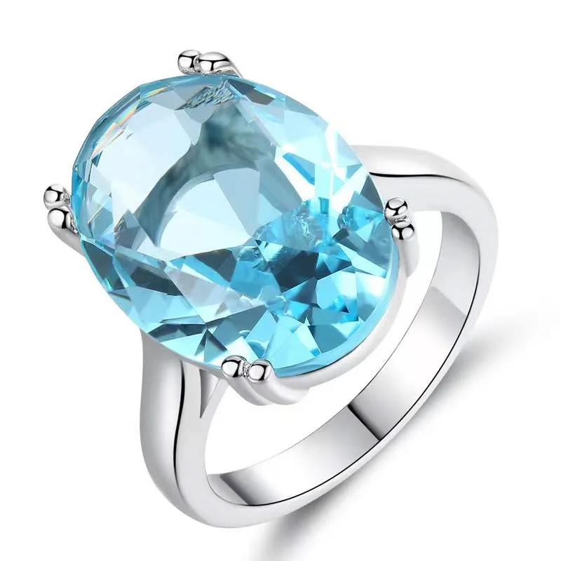 

Milan Girls Inlaid Imitation Blue Crystal Topaz Ring Women New Fashion Style Large Zircon Wedding Ring To Attend The Banquet