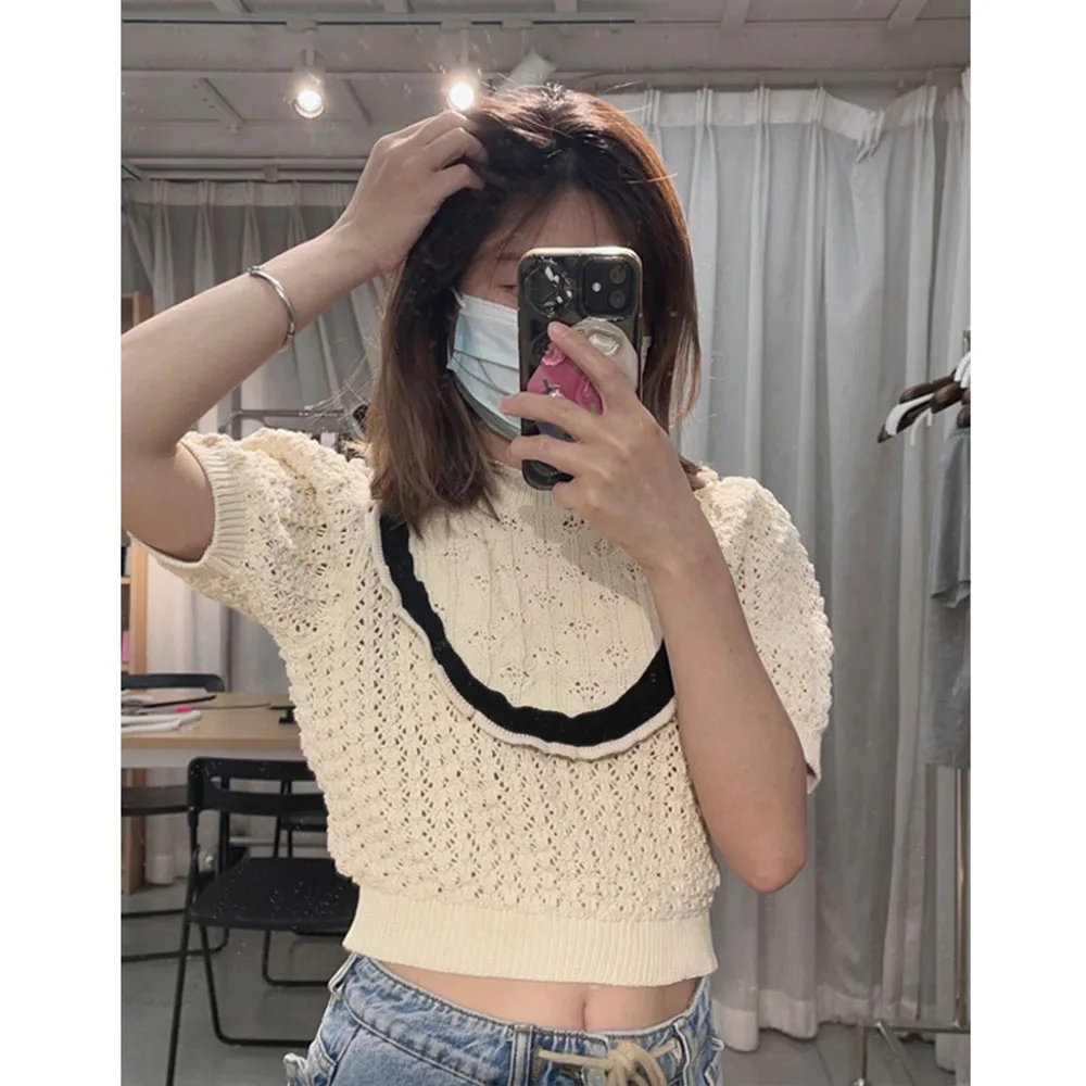 

Весна-Лето Новинка Женская одежда PB & ZA2022 модный ажурный короткий рукав ламинированный декоративный сексуальный трикотажный топ с открытой...