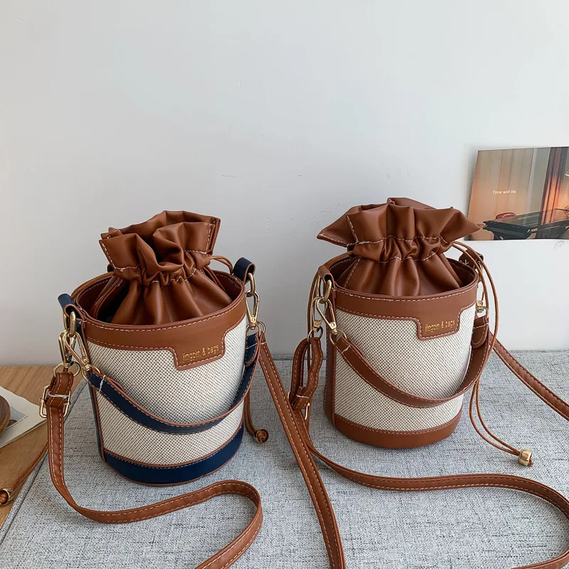 

Women's PU Leather Bucket Crossbody Bag Shoulder Bags Cylinder Casual Drawstring Handbags Purse for Travel Shopping