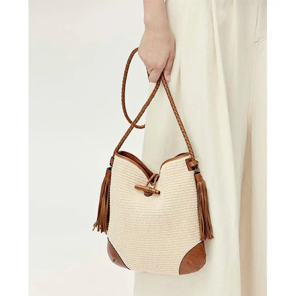 

Ladies T buckle closure tassel straw shoulder bag new frosted bag