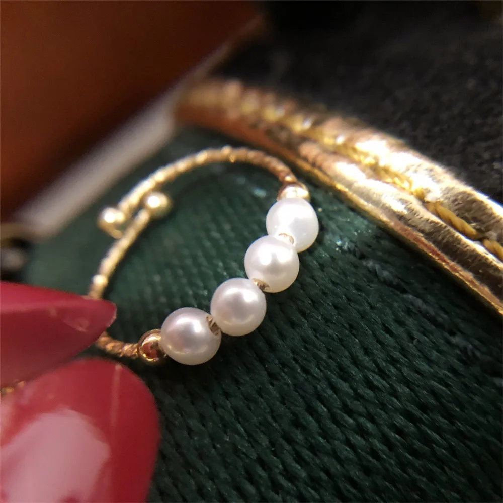 

Imported gold injected ring Natural high quality freshwater pearls 14k imported cut flower ring High quality baby pearls