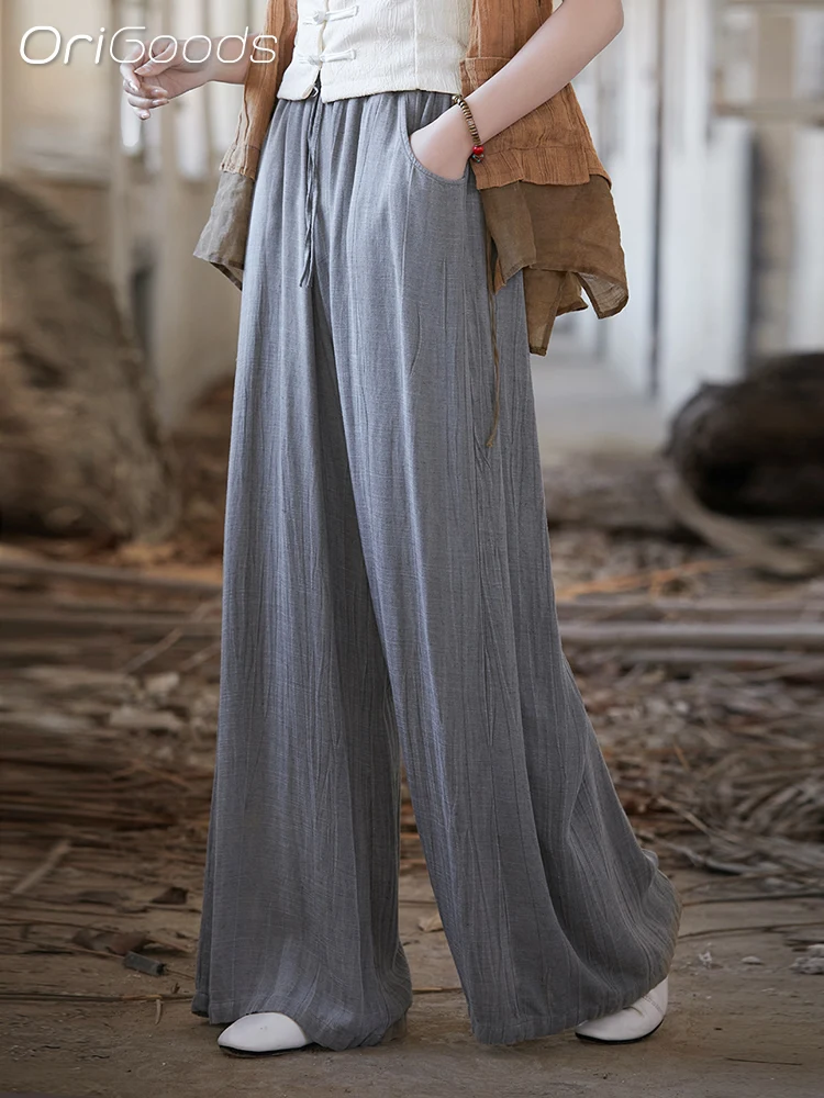 Женские широкие брюки из гладкой тонкой ткани с поясом на резинке