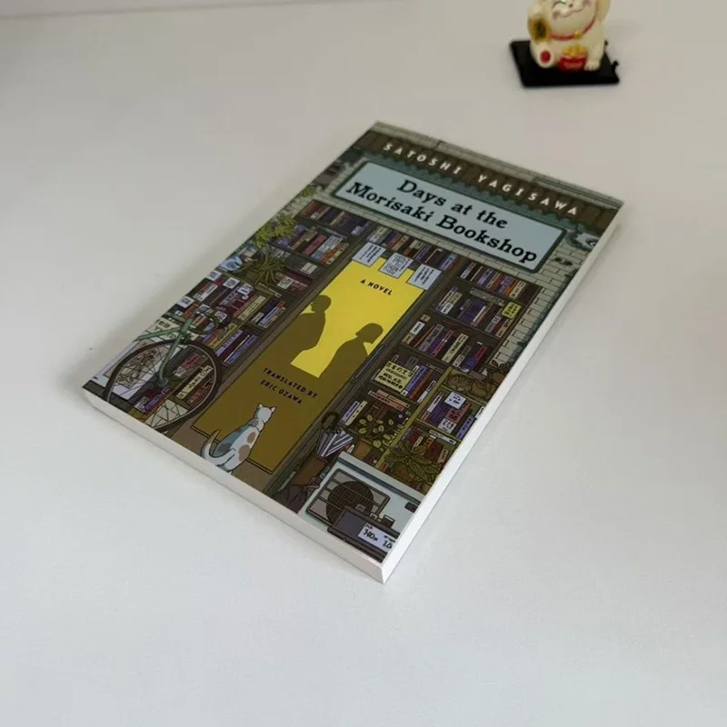 

Days At The Bookshop Morisaki: английская книга в мягкой обложке Libros Livros