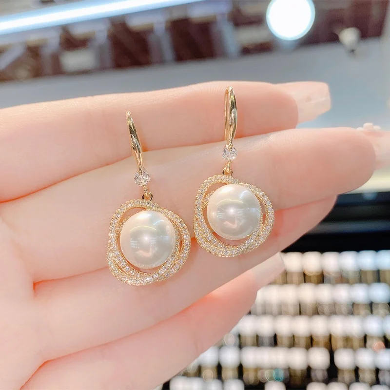 

серьги 2022 тренд серьги женские бижутерия бижутерия люкс качестЖенские позолоченные серьги-шпагатки, круглые серьги с жемчугом и цирконом, ...