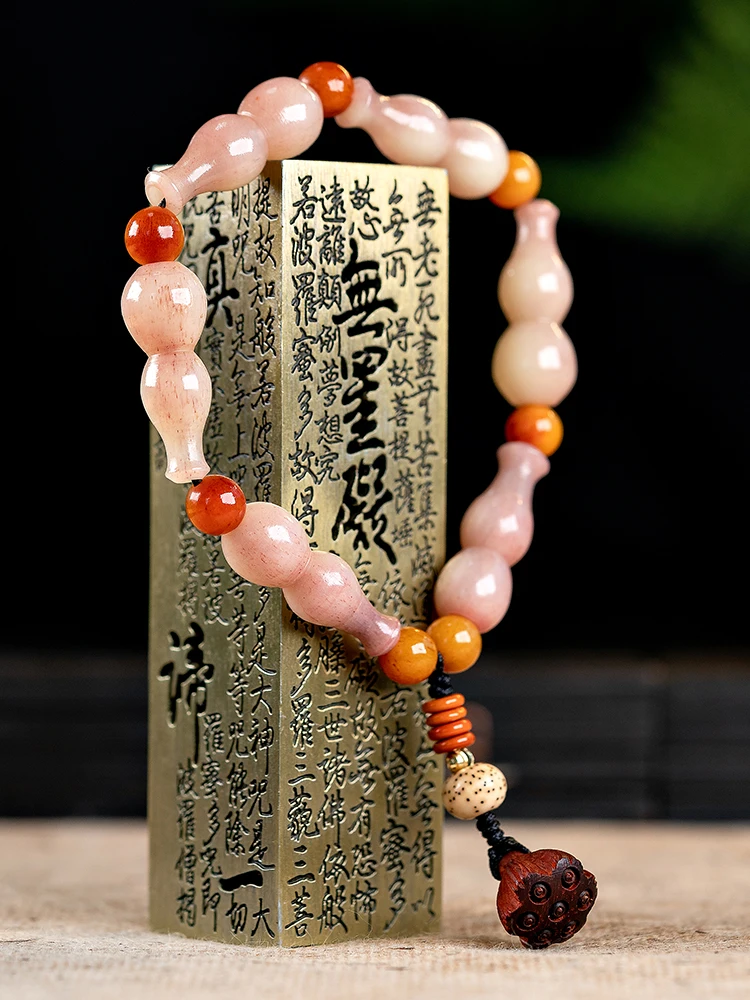 

Натуральная кость маленькая тыква мужской браслет Fu Lu Ankang леди Национальный Ветер жемчужный браслет в этом году