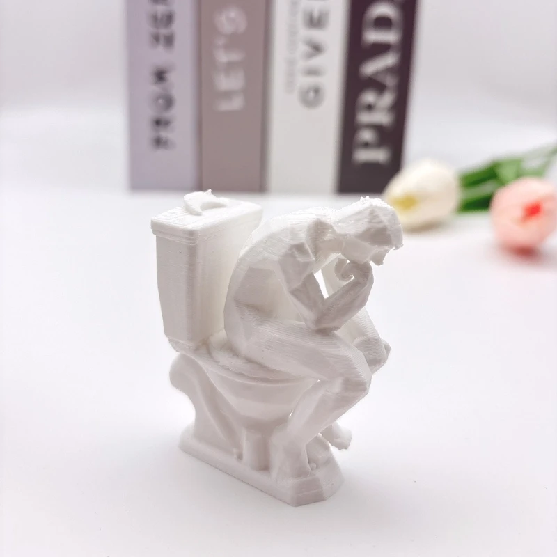 

Статуэтка «Мыслитель»