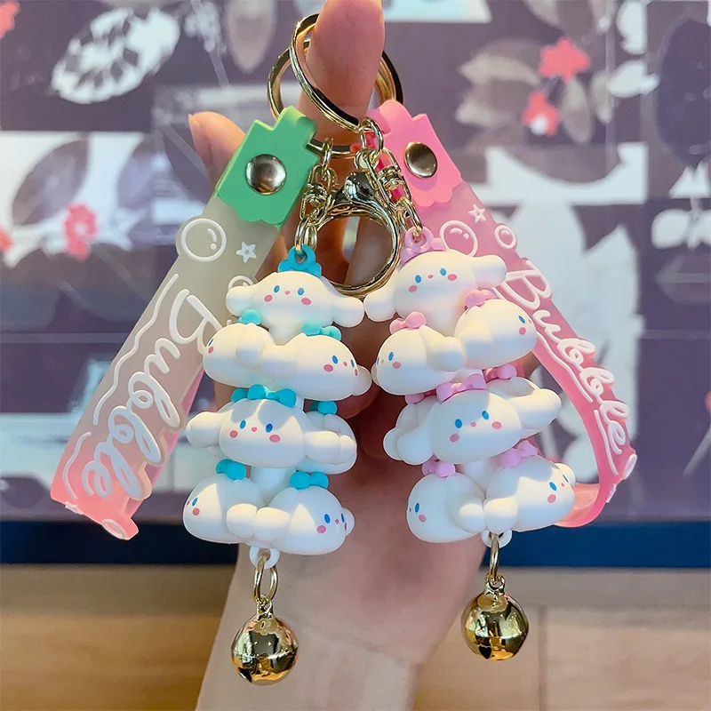 

New Kawaii Sanrio Cartoon Cute Cinnamoroll PVC Jenga The Bell Doll Key Chain Bag Pendant Creativity Girl Heart Ornament Gift