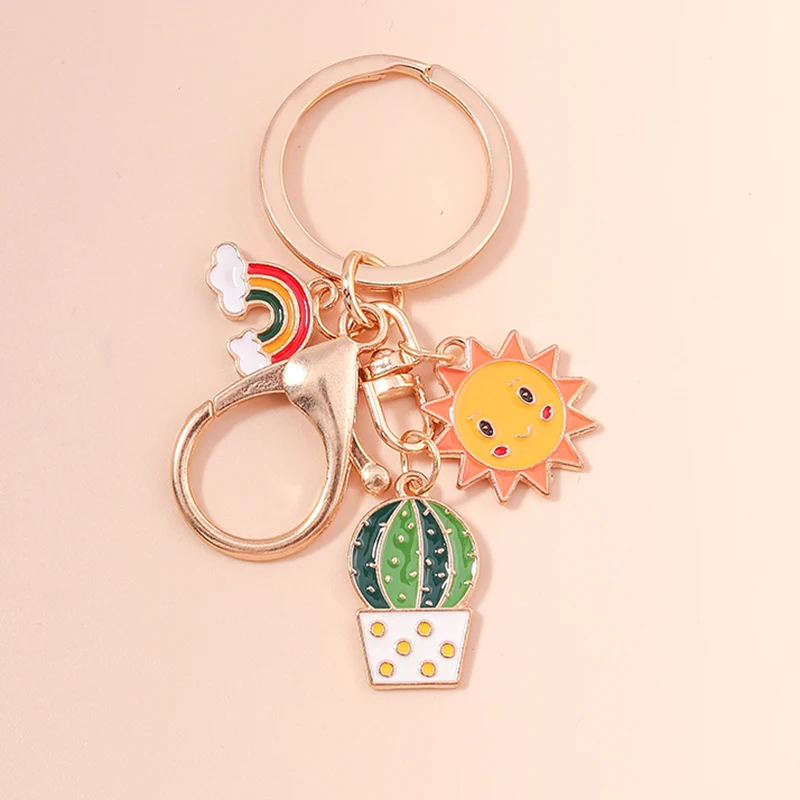

Cute Rainbow Keychains Enamel Plant Cactus Sun Charms Keyrings Souvenir Gifts for Women Men Car Key Handbag Pendants Key Chains
