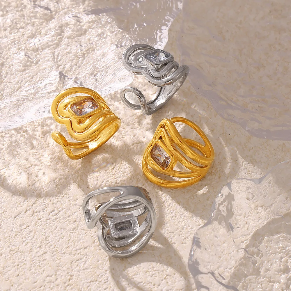 Женское кольцо из нержавеющей стали с позолотой и белым стеклом