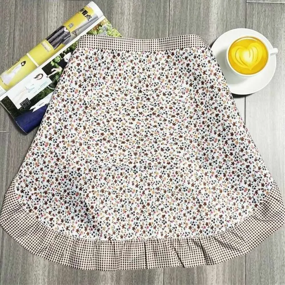 

Короткий фартук нетканый