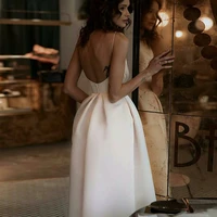 elegant a line ivory sleeveless homecoming dress with backless spaghetti straps mid length simple satin customizable prom gown