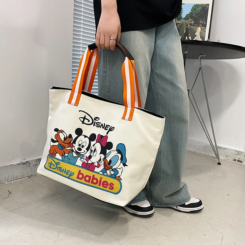 

Холщовые сумки с мультипликационным рисунком для студентов, модные сумки на одно плечо, вместительная Повседневная Сумка-тоут 2022, новый стиль, Disney фирменные сумки для покупок