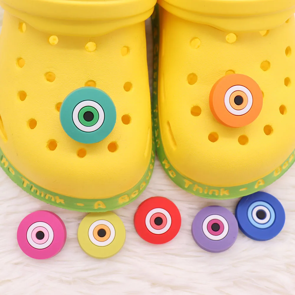 

Mix 50PCS PVC Buckle Clog Colorful Eys Series Croc Jibz Fit Wristbands Garden Shoes Button Decorations Kids Party Xmas Gifts