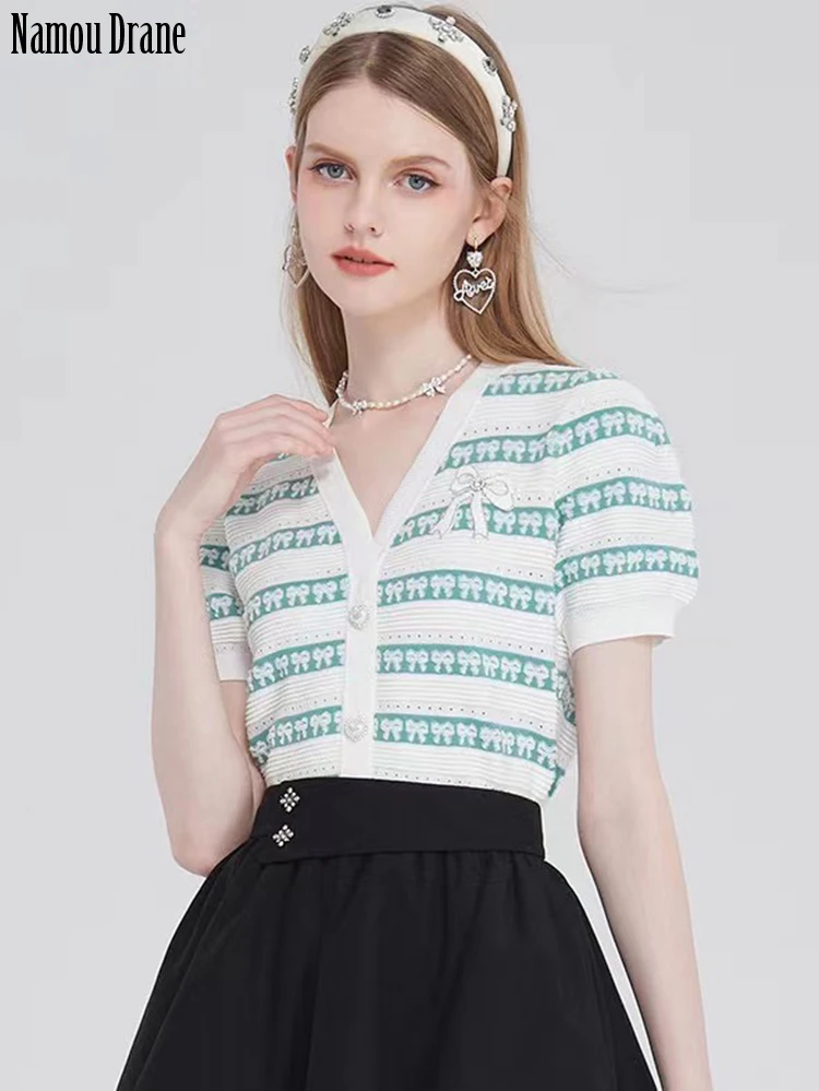 

Женский трикотажный свитер с V-образным вырезом и рукавами-фонариками