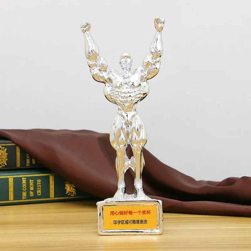 Позолоченная статуэтка мышц из смолы