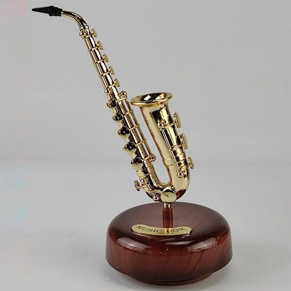 

Dropshipping!! Hand Cranked Music Box Rotating Plastic Musical Instrument Model Musical Box Decor with Stand Party Supplies
