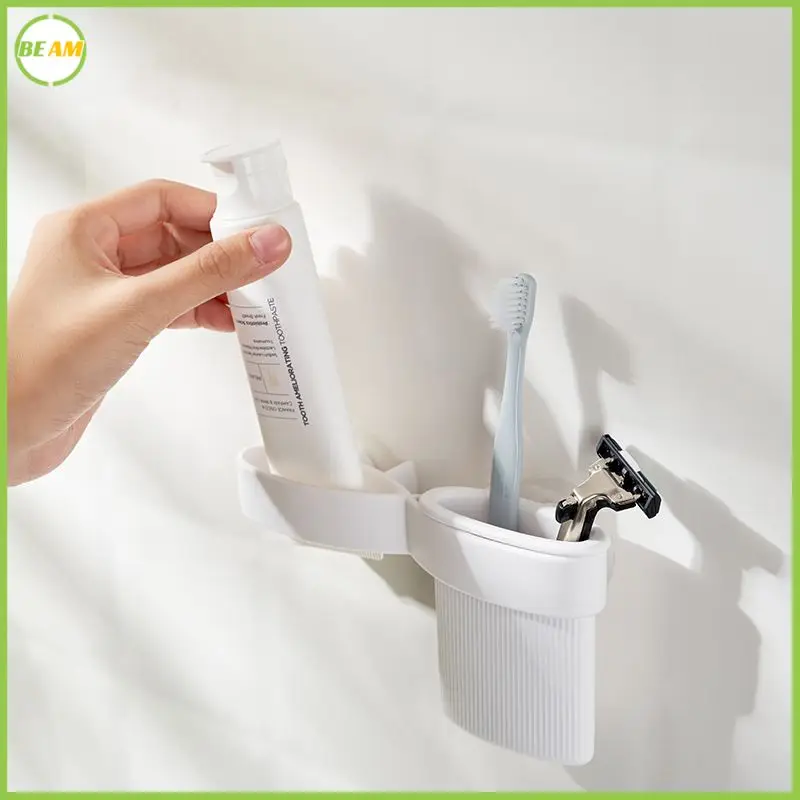 

Toothbrush rack bathroom toilet wall-mounted free punching facial cleanser storage clip razor hanger shelf squeeze toothpaste