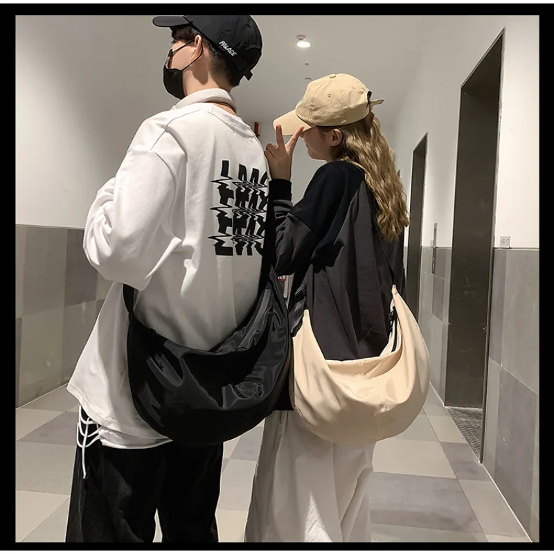 

Single-shoulder Bag New Street Trend Large Capacity Backpack Simple Dumpling Bag Fashion Trend Men's and Women's Messenger Bag