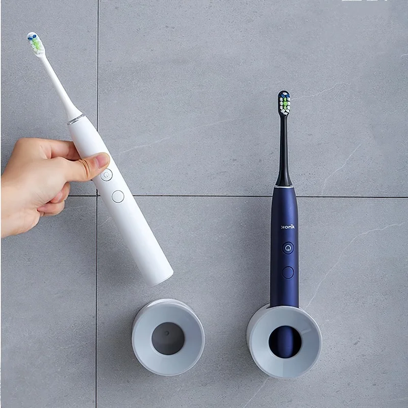 

Punch-free Electric Toothbrush Holder Wall-mounted Hanger Suction Wall Toothbrush Storage Rack Bathroom Traceless Storage Rack