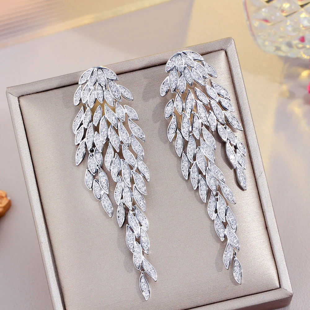 

ThreeGraces Brilliant Cubic Zirconia Feather Shape Long Dangle Bridal Earrings for Women Brazilian Fashion Wedding Jewelry E1270