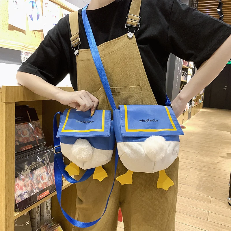 

Ins Net Red Cartoon Donald Duck Asshole Children's Parent-child One Shoulder Cross Messenger Mobile Phone Bag Women's Bag