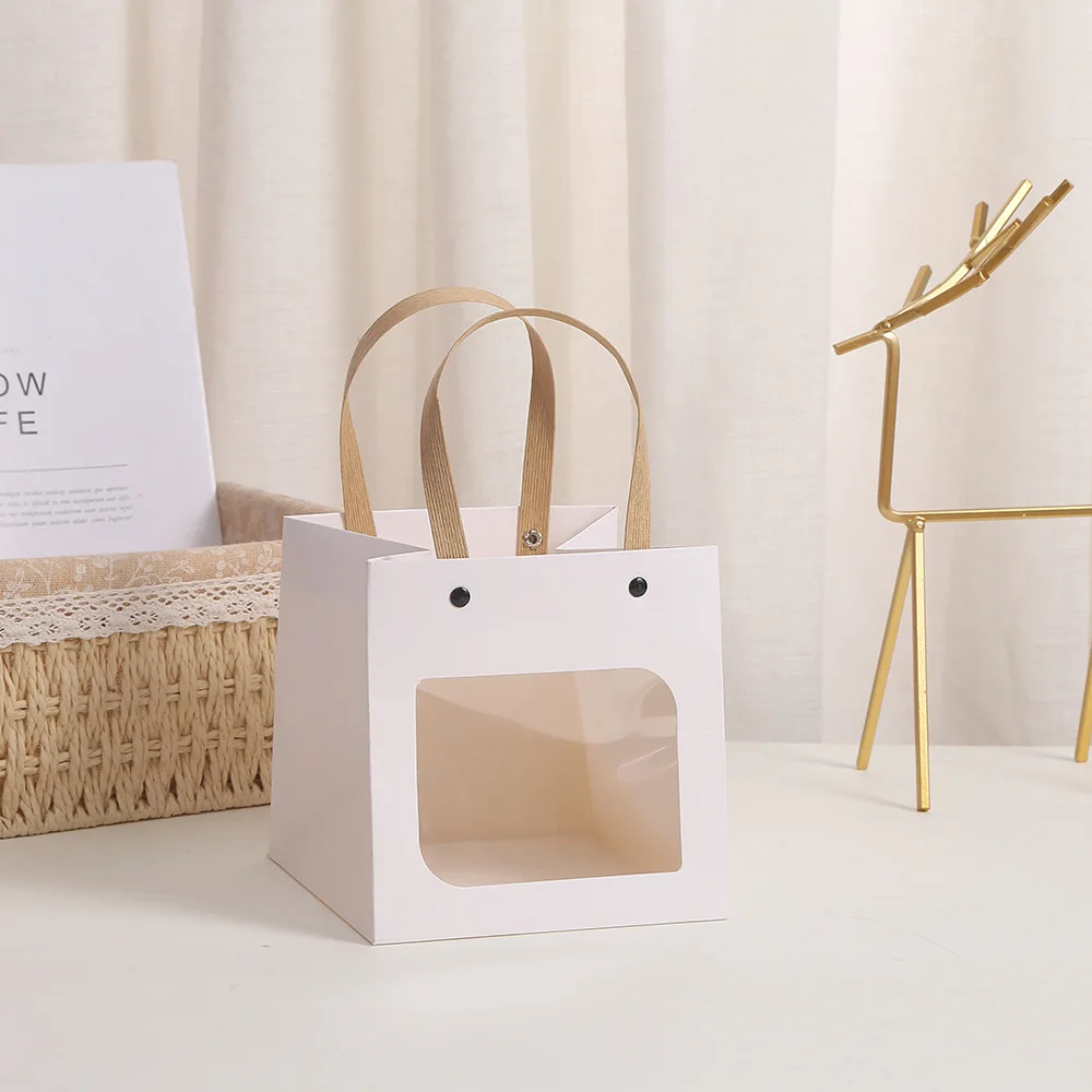 

Подарочные пакеты из крафт-бумаги