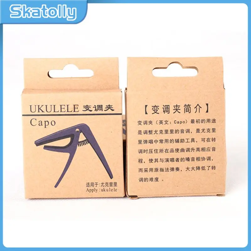 

Professional Ukulele Capo 4 Strings Hawaii Guitar Capo Single-handed Quick Change Ukelele Capo Guitar Tuner Guitar Accessories