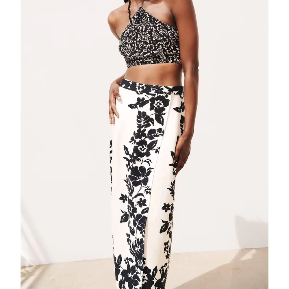 

Женская летняя юбка миди с цветочным принтом, модная повседневная юбка в европейском и американском праздничном стиле с высокой талией и ра...