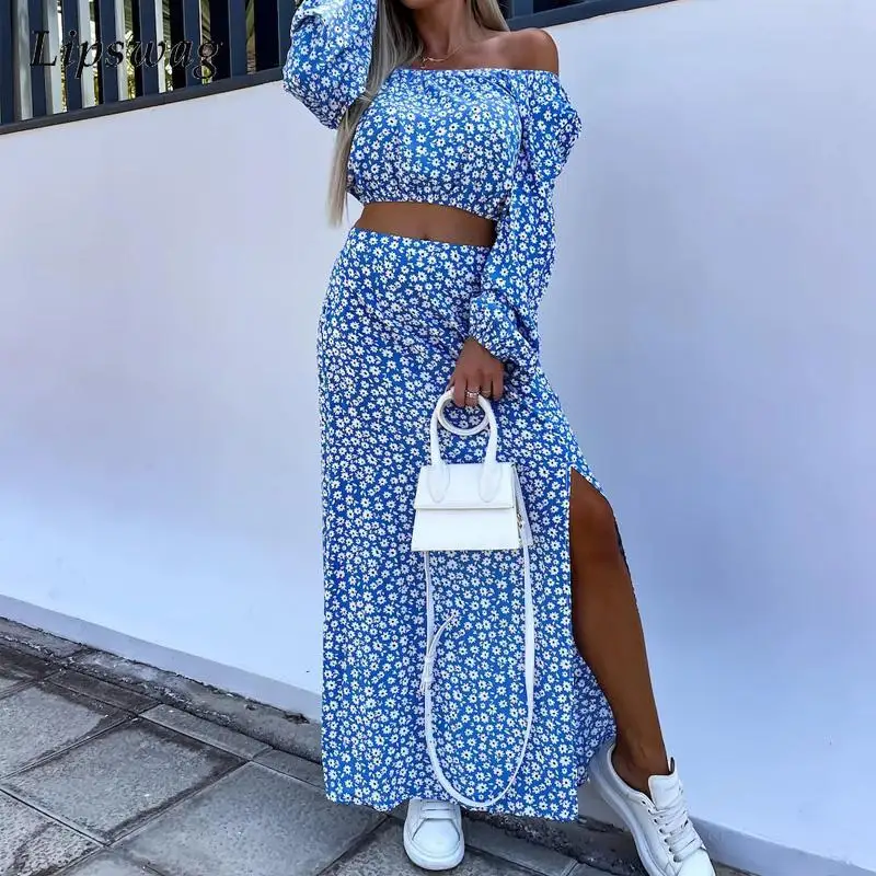 

Женский комплект из топа с вырезом лодочкой и длинной юбки с разрезом