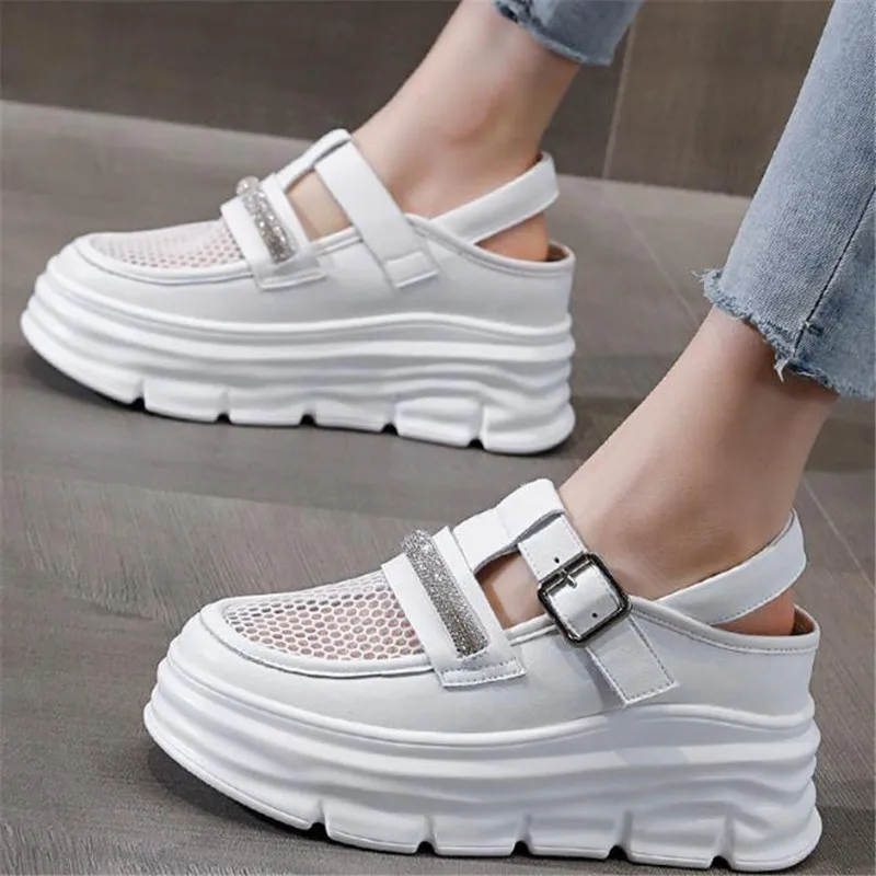 

Женские летние кроссовки из натуральной кожи на танкетке 7 см