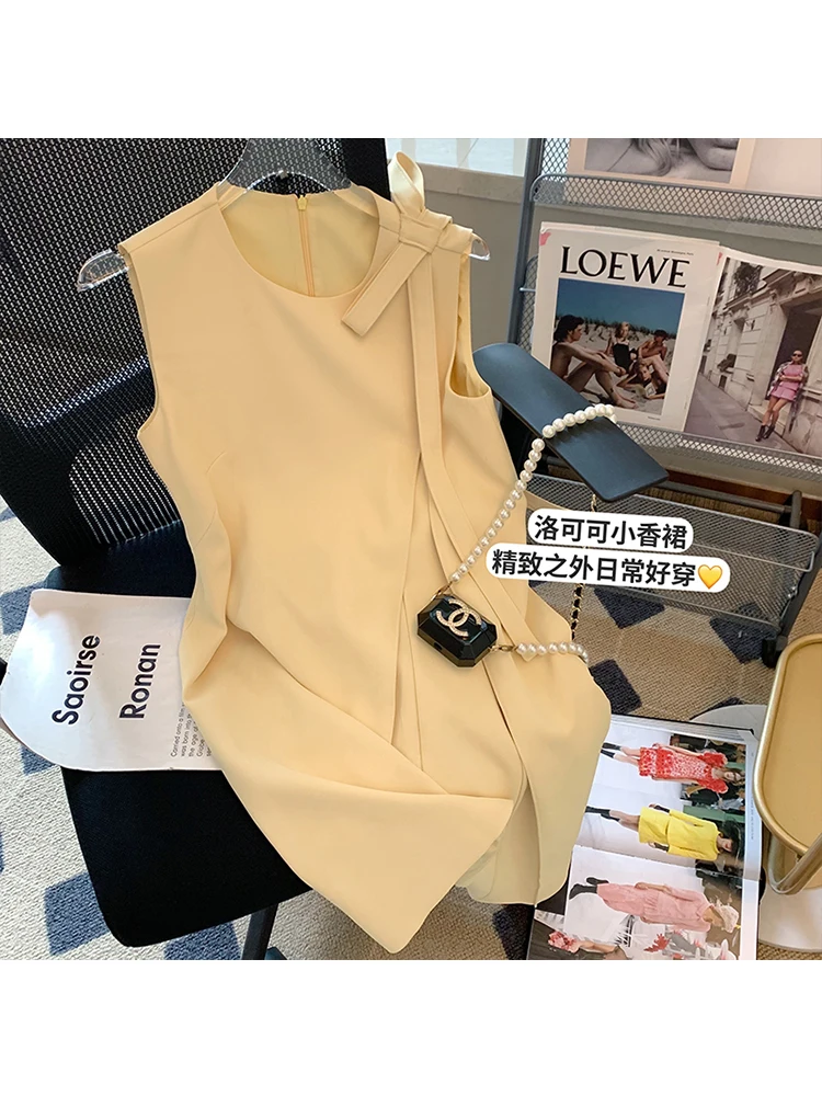 

Женское однотонное мини-платье во французском стиле, элегантное простое Плиссированное базовое платье без рукавов с круглым вырезом и бант...