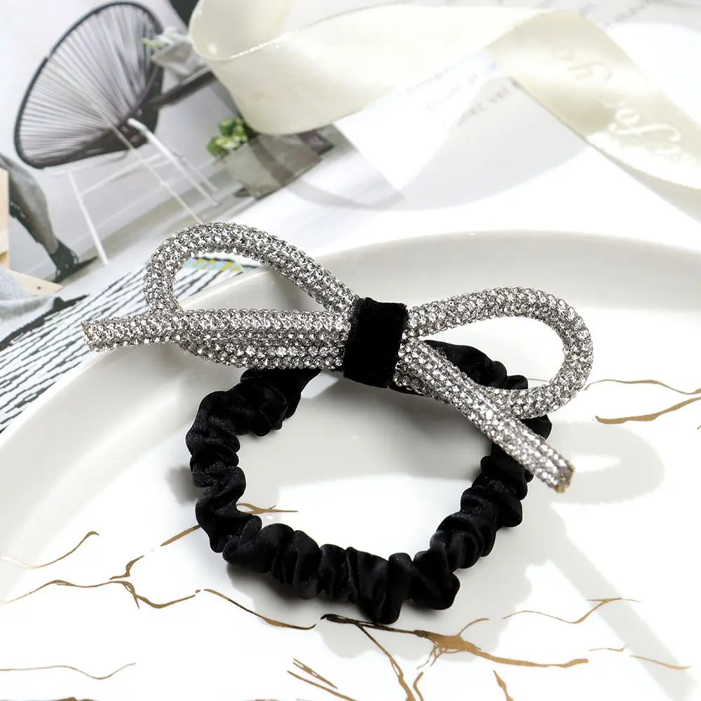 

South Korea's Dongdaemun Shiny diamond-studded bow hair ring head rope ins fashionable wild sweet tie hair rubber band Women