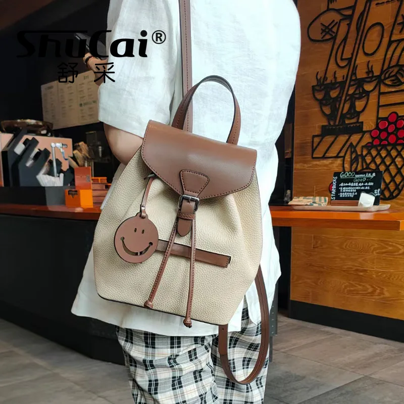 2022 new drawstring leather women's shoulder bag first layer cowhide contrast color leisure travel large-capacity backpack