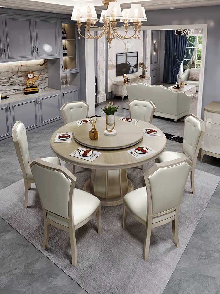 

American light luxury modern round art solid wood dining table and chair combination European luxury dining table