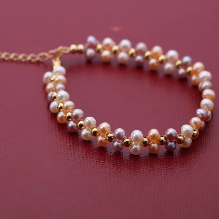 

Freshwater real pearl bracelet 4-5MM round strong light pure hand-woven double-layer mixed color women
