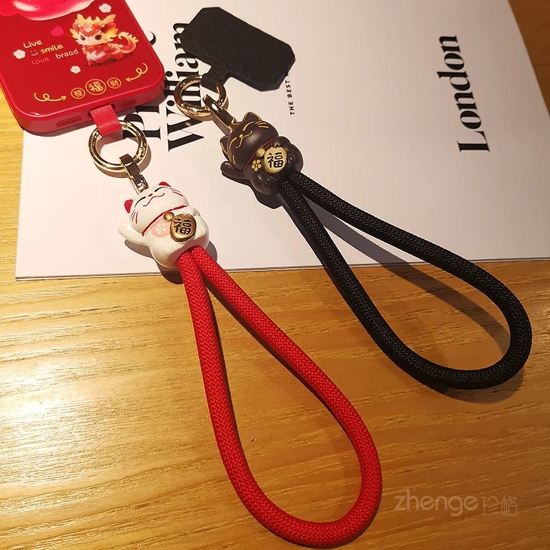 Ремень Zhaocai на запястье Женский короткий ручной держатель для телефона с Красной