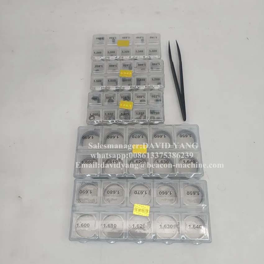 400 шт. Запасные части для ремонта форсунок Common Rail: шайбы для регулировки, прокладки и промывочные подложки.