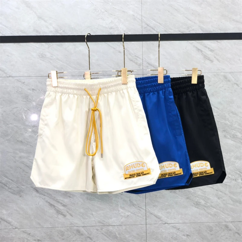 

2023ss Black Blue Apricot Rhude Letter Embroidery Casual Shorts Men Women Inside Mesh Drawstring RHUDE Breeches