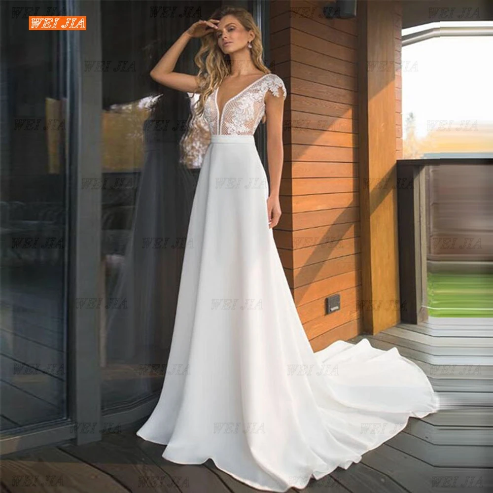 

2022 Elegant Lace Appliques A-Line Cap Sleeves Floor Length Backless Bridal Gown Boho Deep V-Neck Satin Wedding Dress WEI JIA